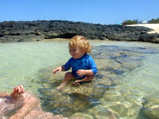 Danny on rock in sea